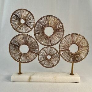 Circle Sculpture on Marble Stand